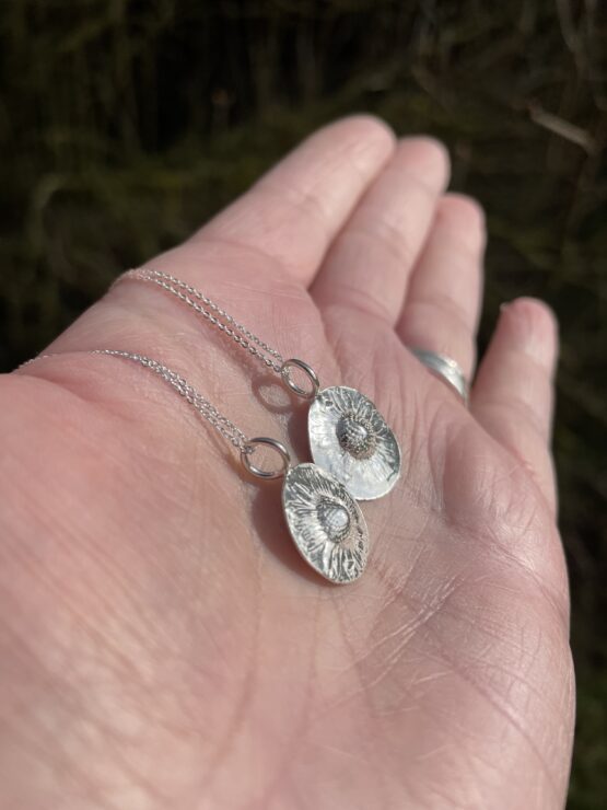 Chilli Designs fine silver daisy pendant